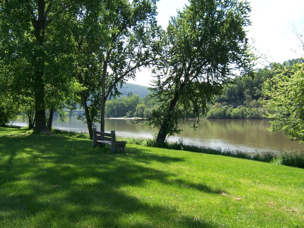 A bench looking out over the Susquehanna River at Tunkhannock's Riverside Park