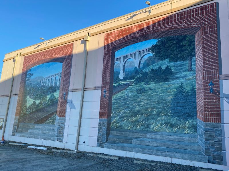 Mural of the Tunkhannock Creek Viaduct, a concrete railroad bridge.